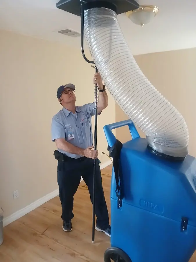 Mini Split Installation technician using HEPA equipment in Eden Prairie